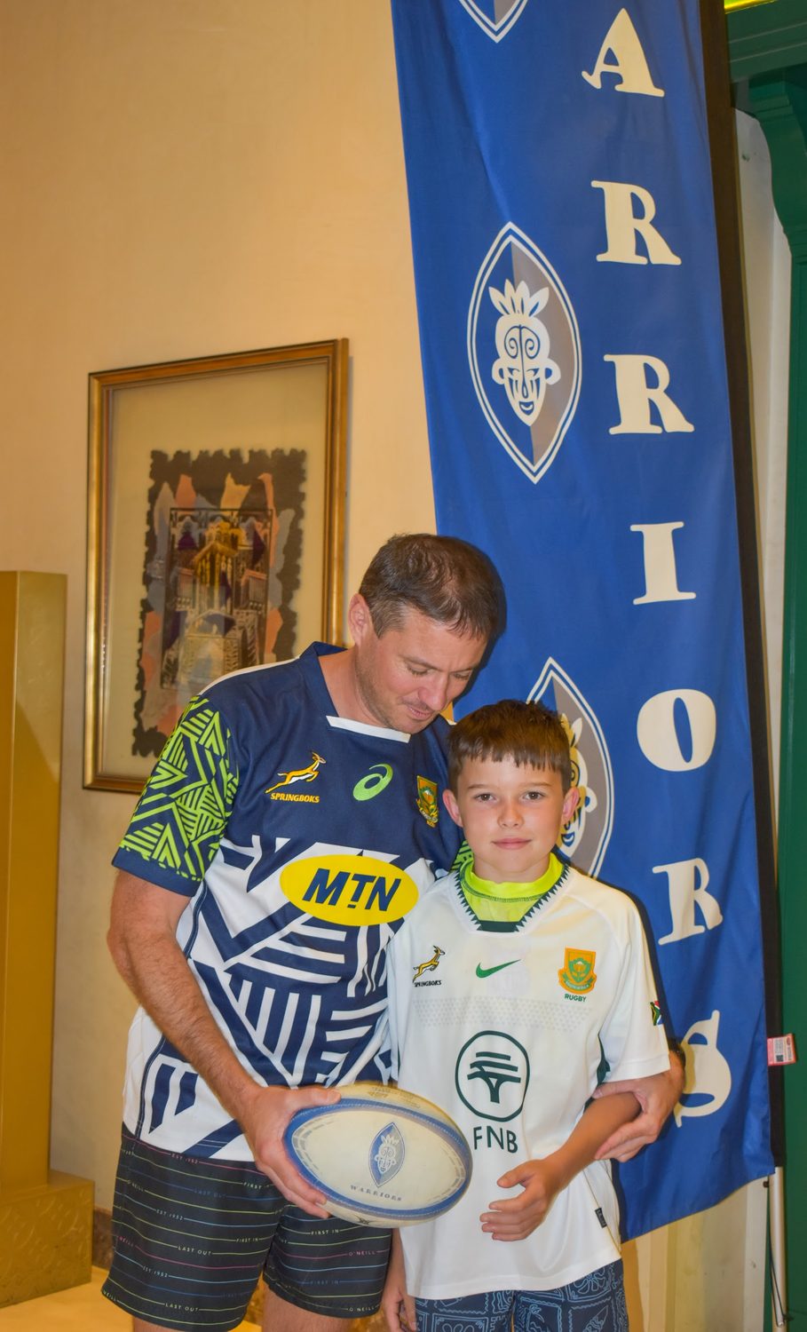 Two young players collect their awards